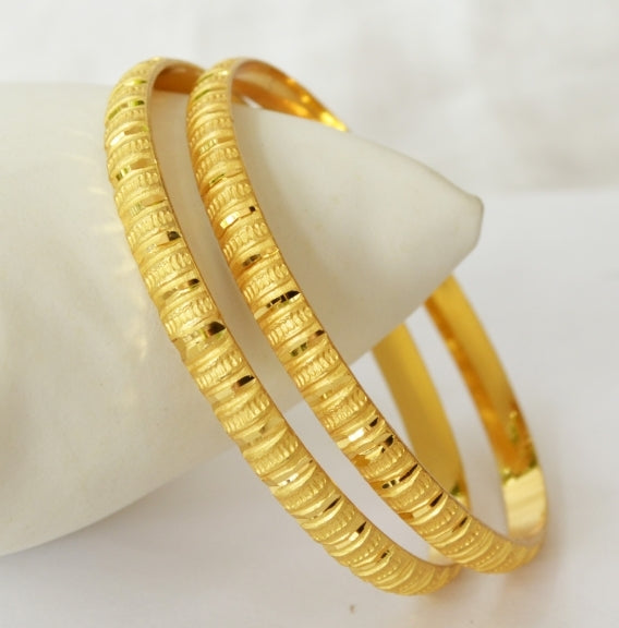 Beautiful gold plated cut design bangles
